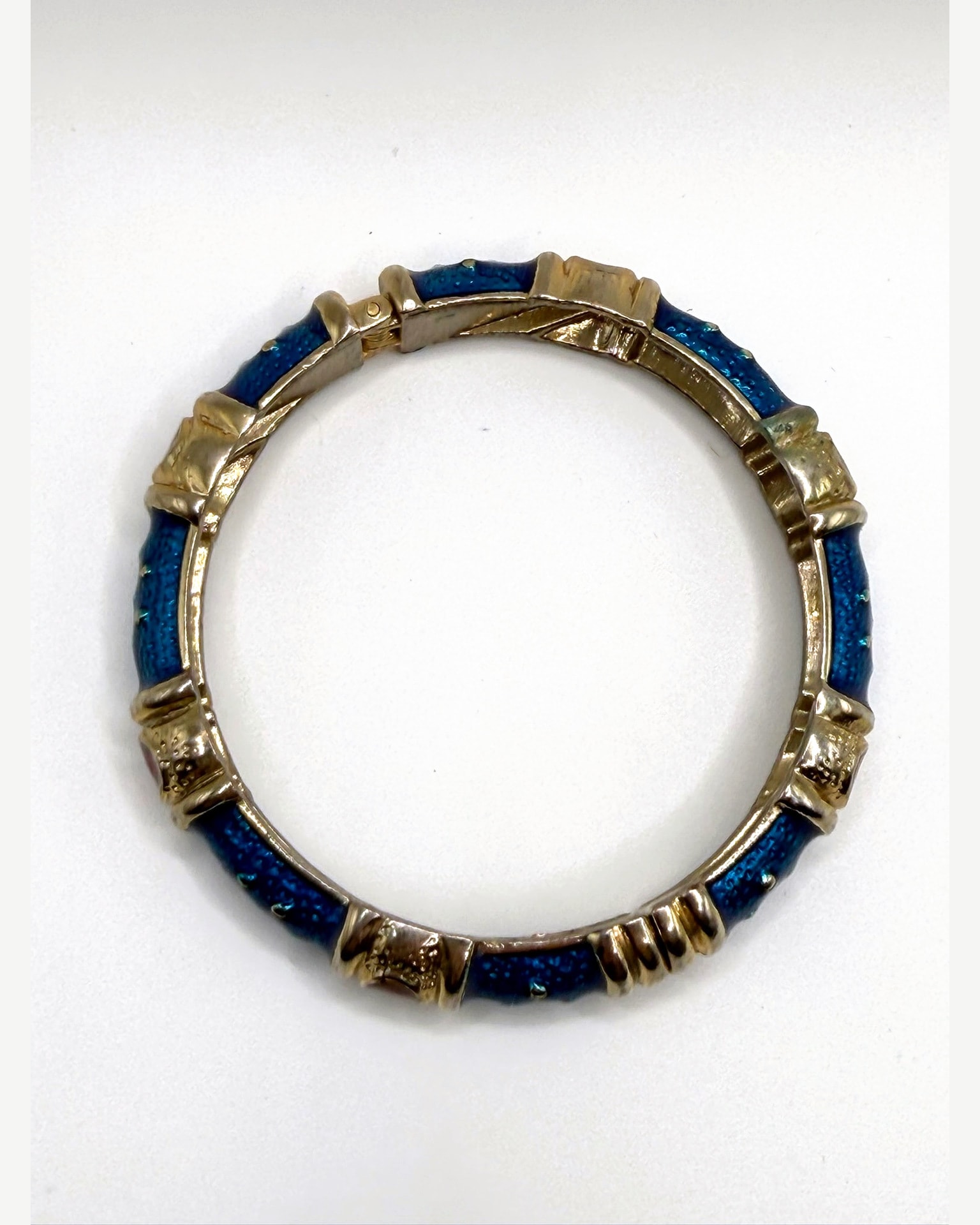 Gold-Tone Hinged Bangle Bracelet with Blue Textured Inlay