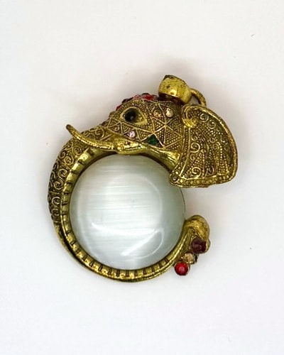 Vintage Style Gold-Tone Elephant Brooch with White Cabochon Accent