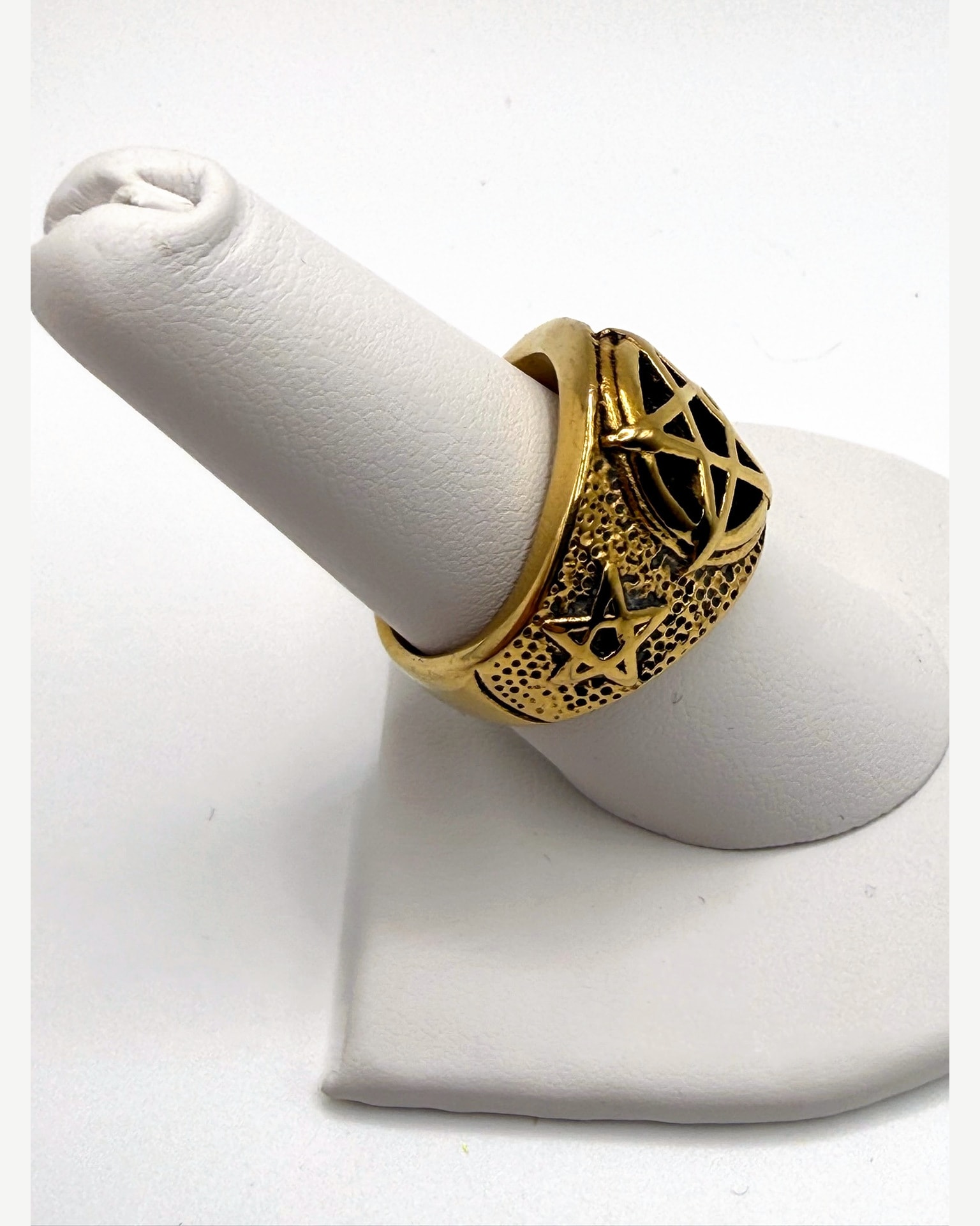 Gold-Tone Wide Band Ring with Black Openwork and Star Motif