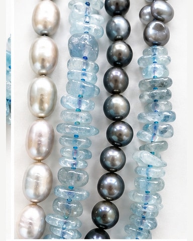 Light Blue Multi-Strand Chip Bead Statement Necklace with Carved Floral Clasp